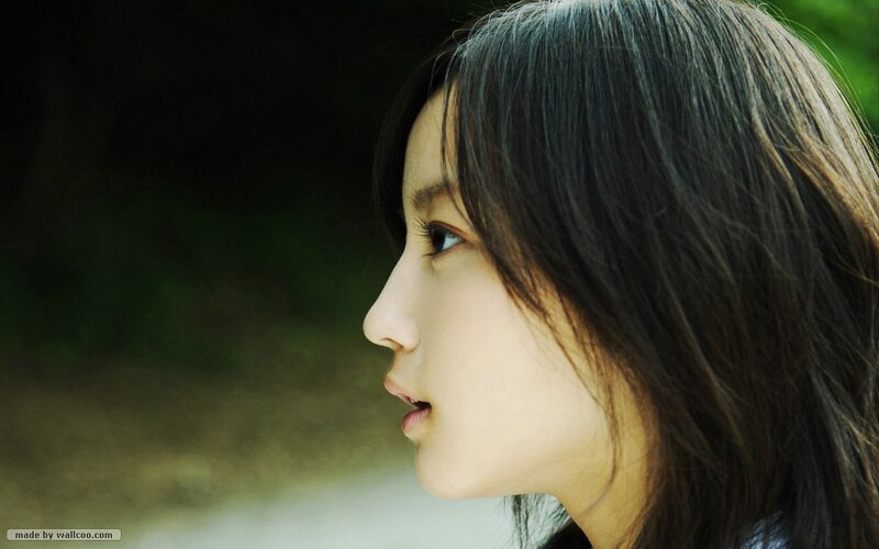 woman in profile outdoors