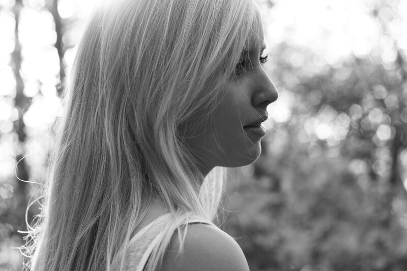 woman in profile outdoors