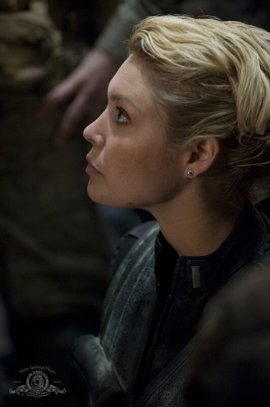 woman in profile wearing jacket