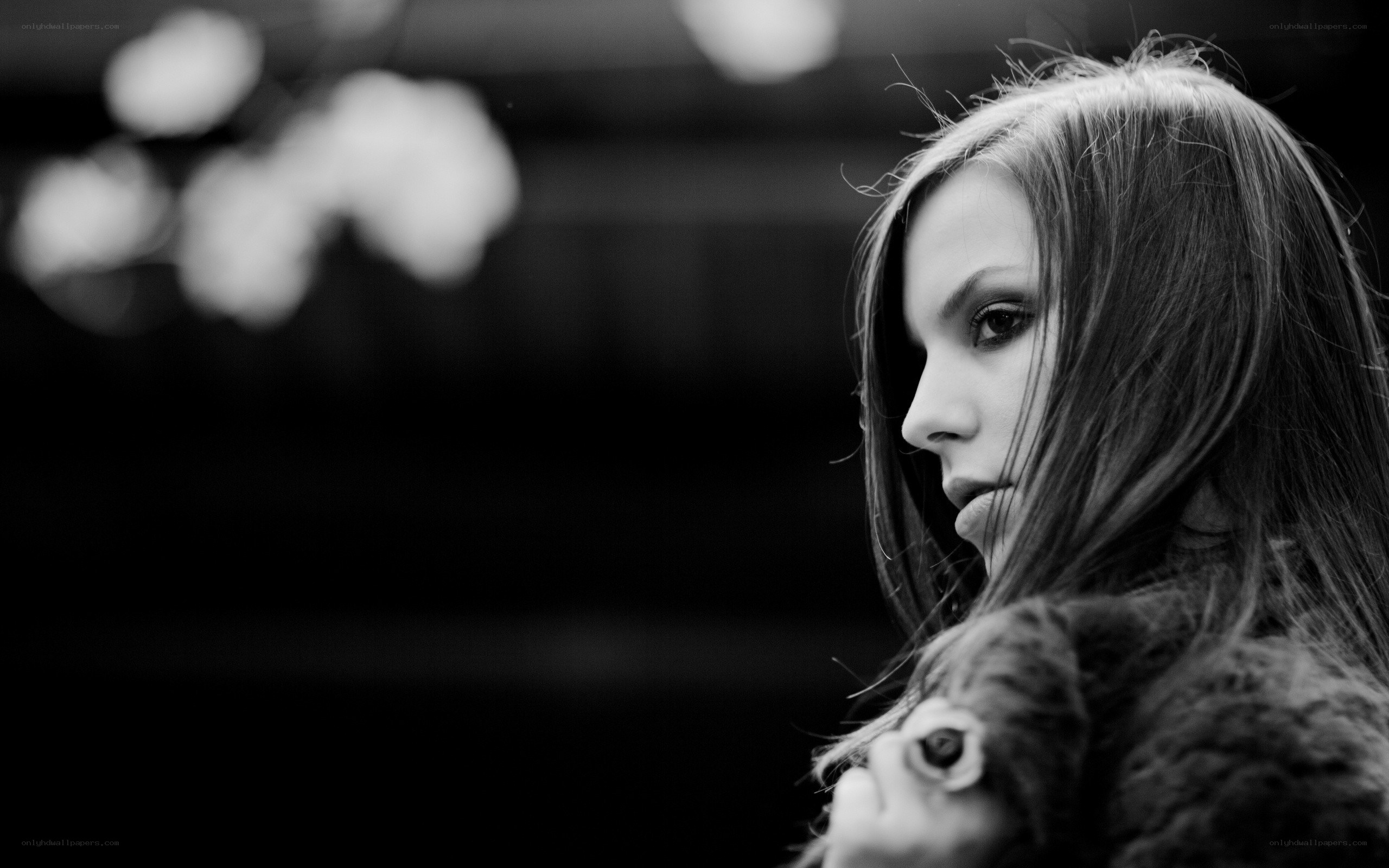 woman in profile with cat