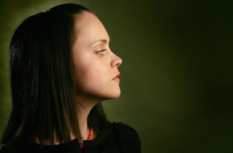 woman in profile with closed eyes