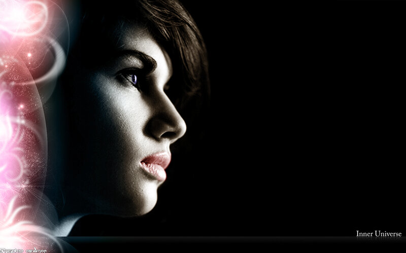 woman in profile with cosmic light