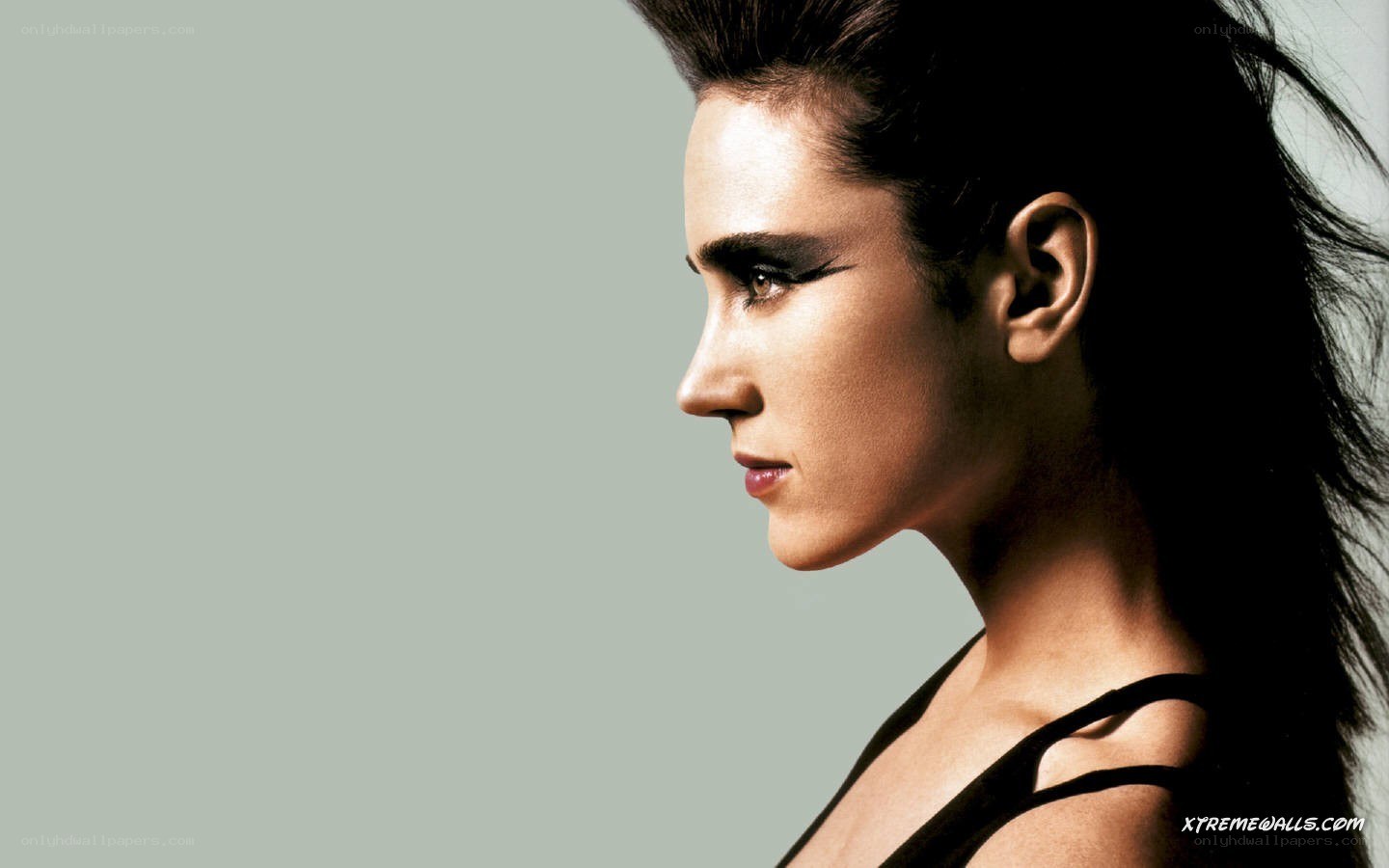woman in profile with dramatic makeup
