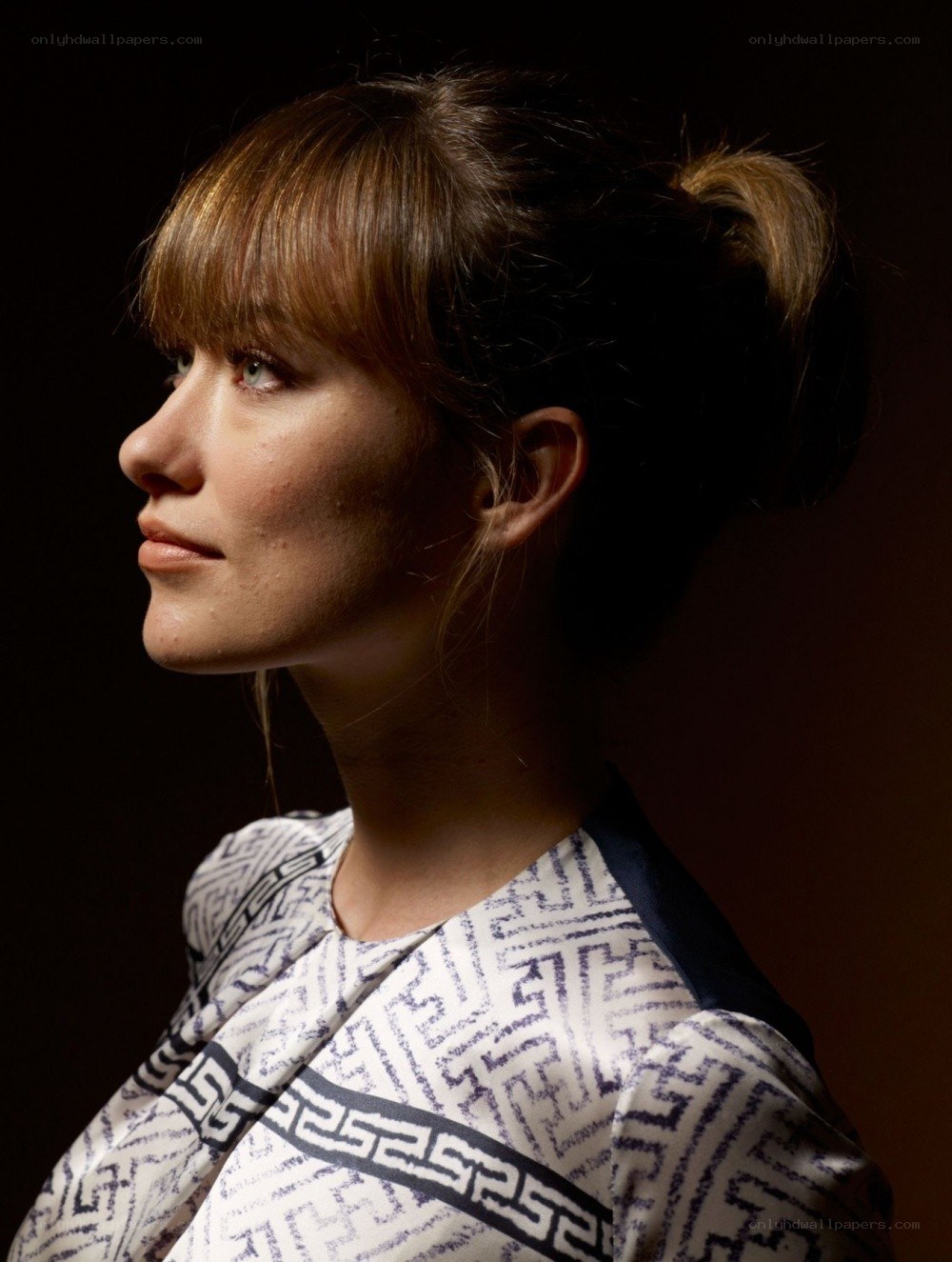 woman in profile with geometric pattern