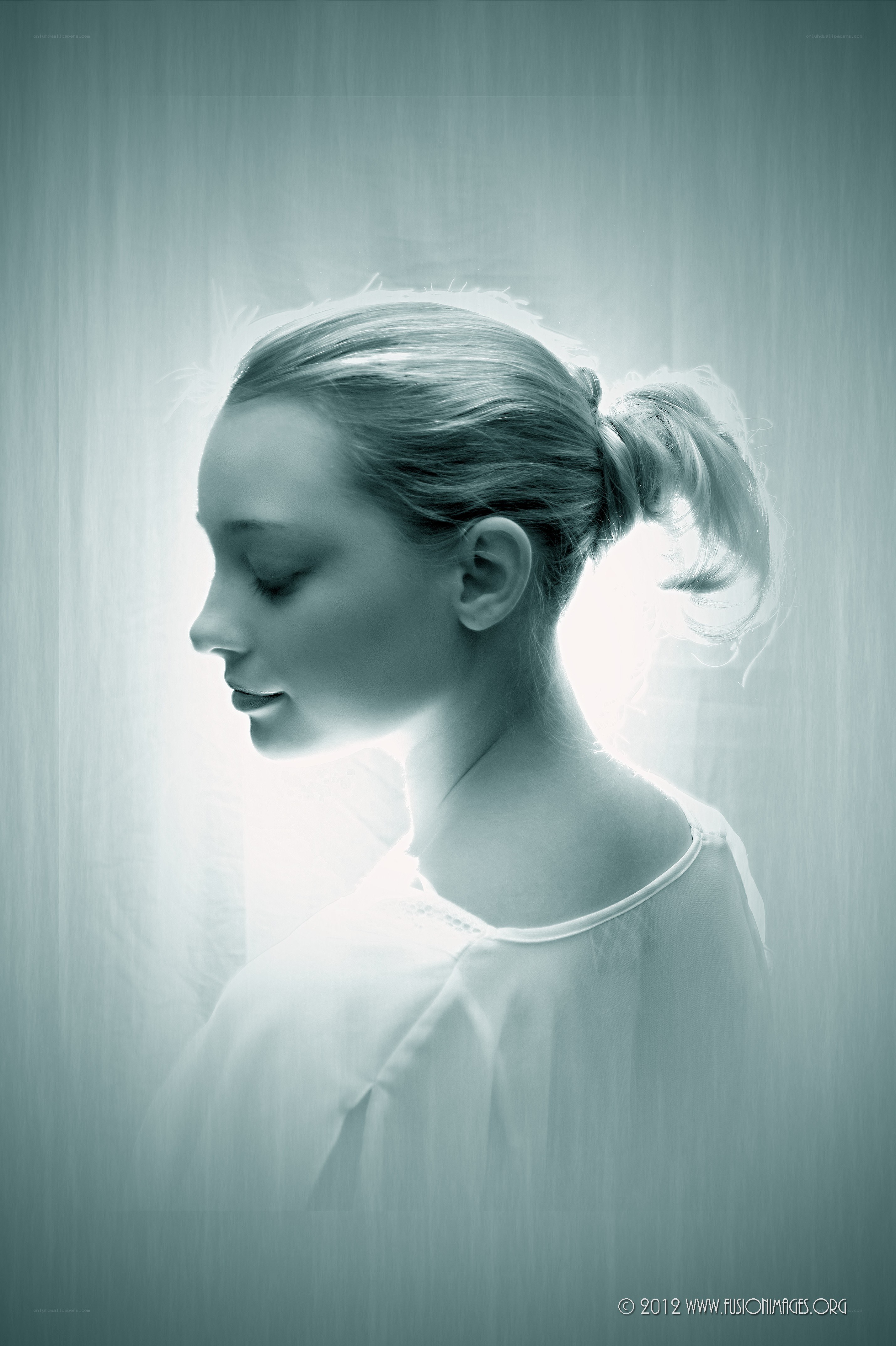 woman in profile with light