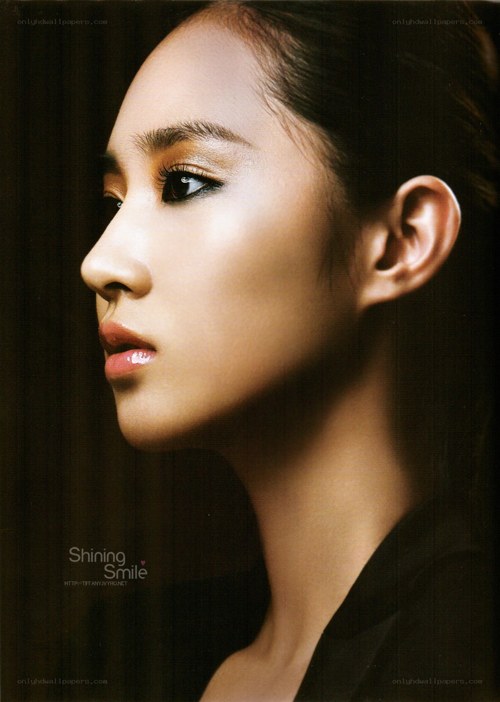 woman in profile with makeup