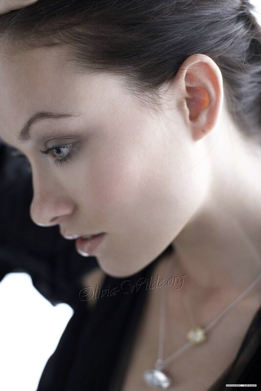 woman in profile with necklace