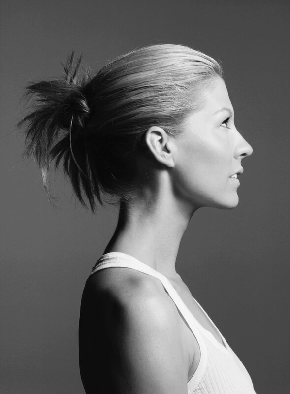 woman in profile with ponytail