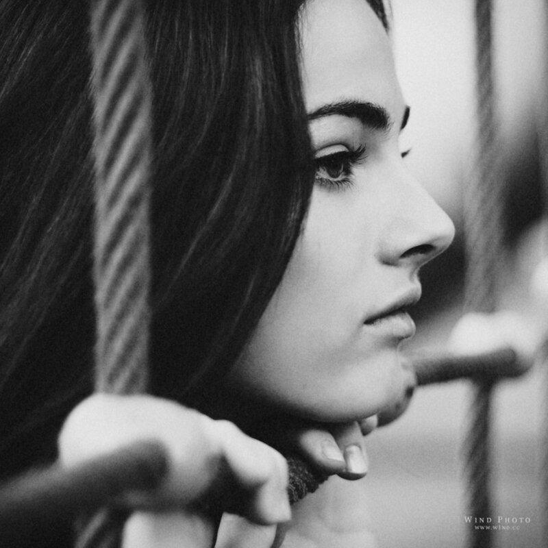 woman in profile with rope