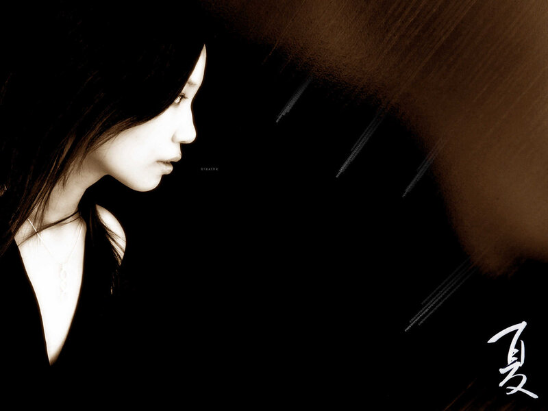 woman in profile with sepia tones