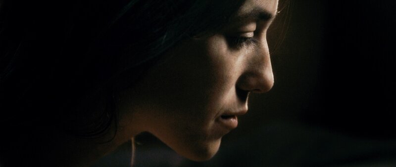 woman in profile with soft lighting