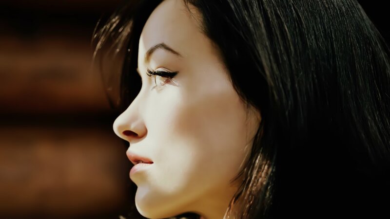 woman in profile with sunlight