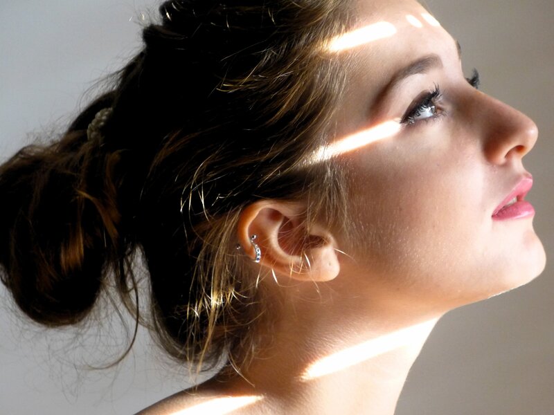 woman in profile with sunlight
