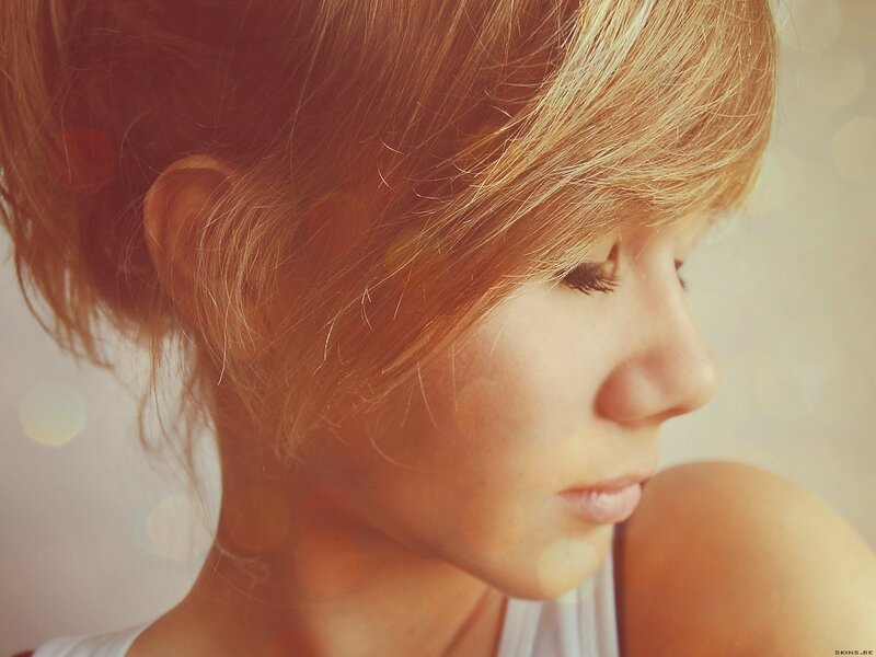 woman in profile with warm light