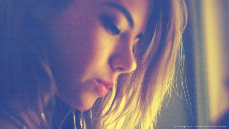 woman in profile with warm light