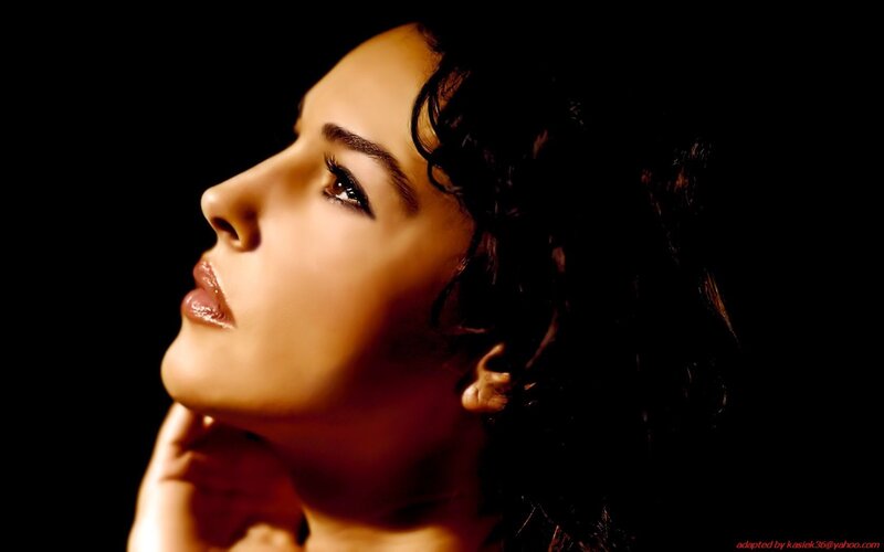 woman in profile with warm lighting