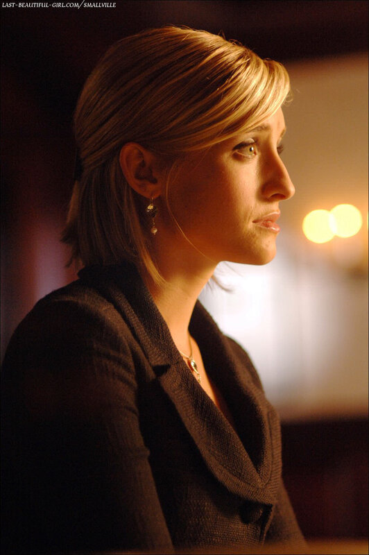woman in profile with warm lighting