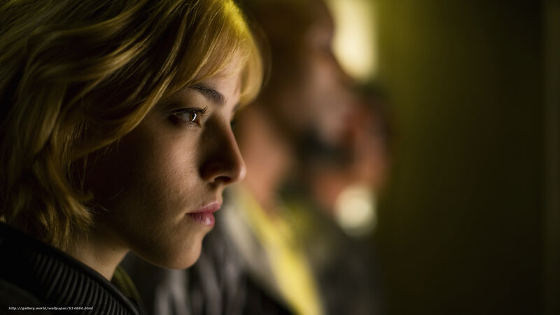 woman in profile with warm lighting