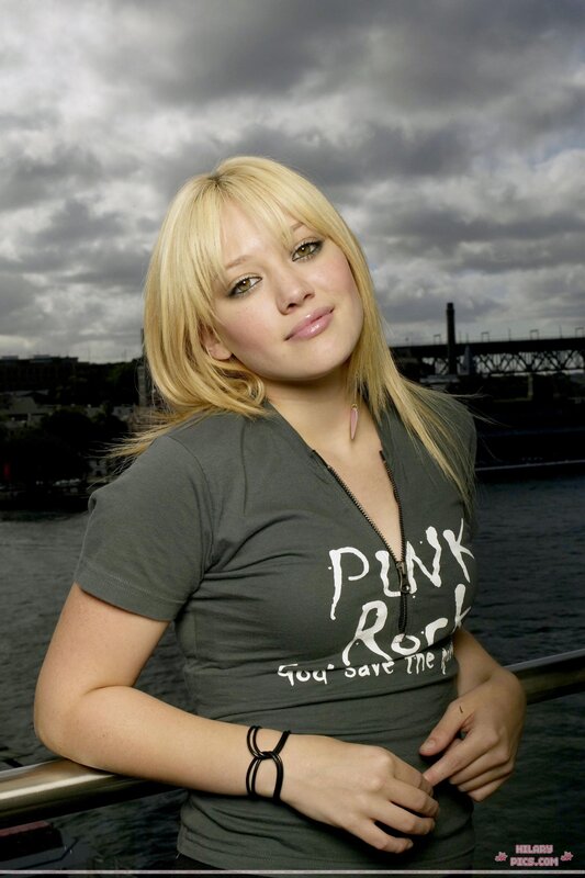 woman in punk rock shirt
