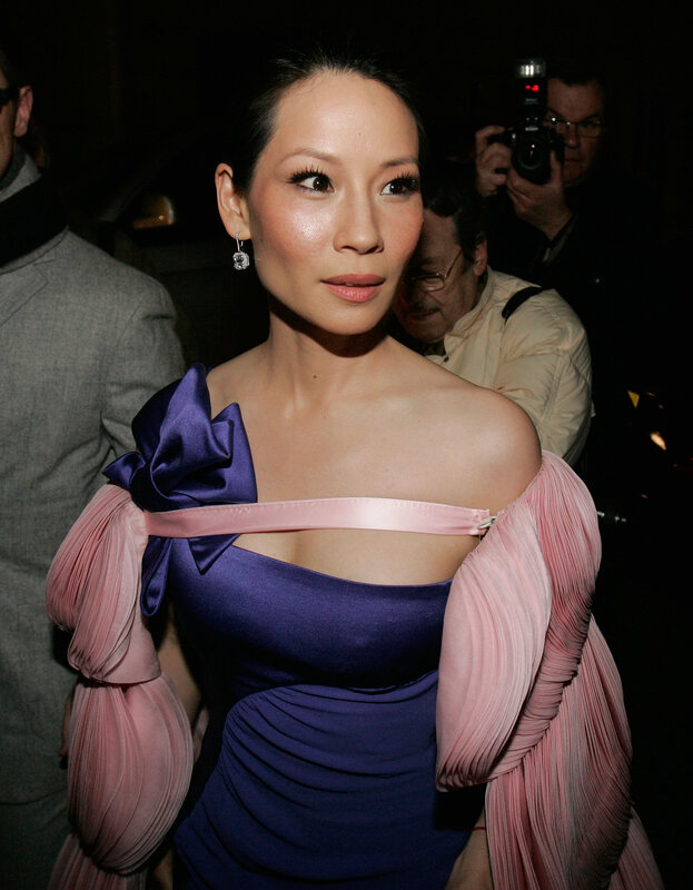 woman in purple and pink dress