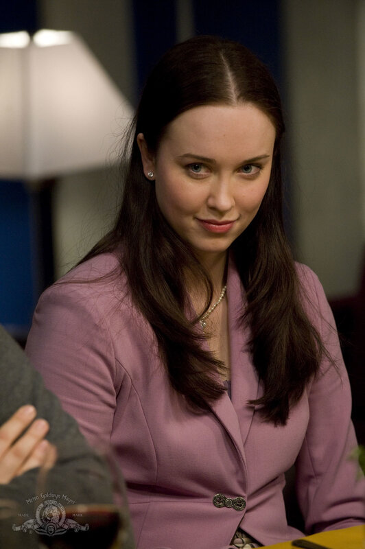 woman in purple blazer