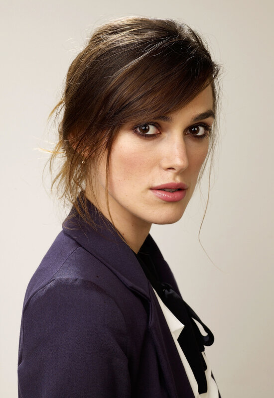 woman in purple blazer