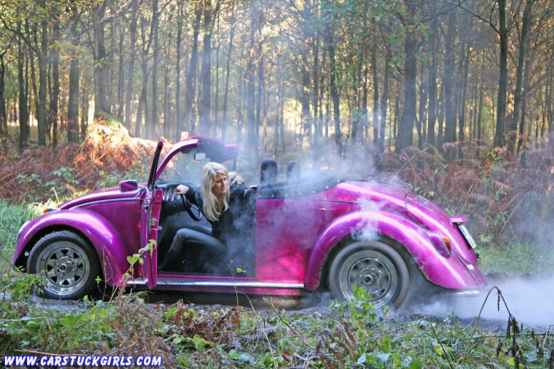 Woman in Purple Car