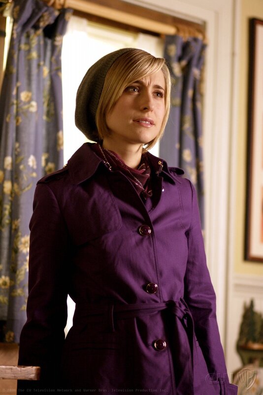 Woman in purple coat