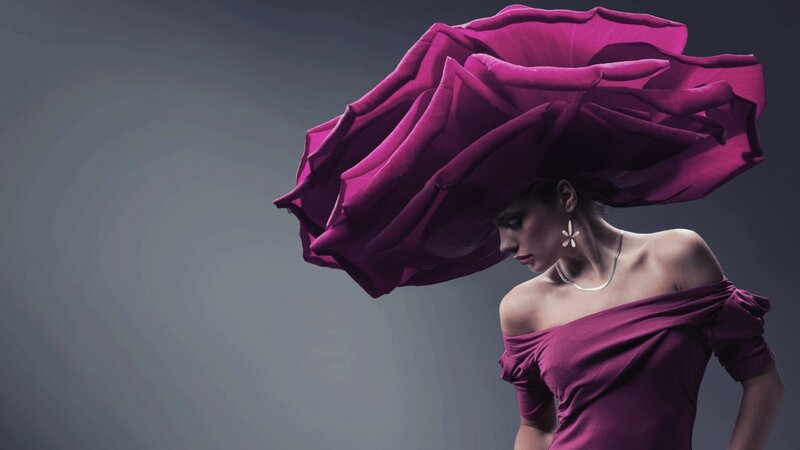woman in purple dress and hat