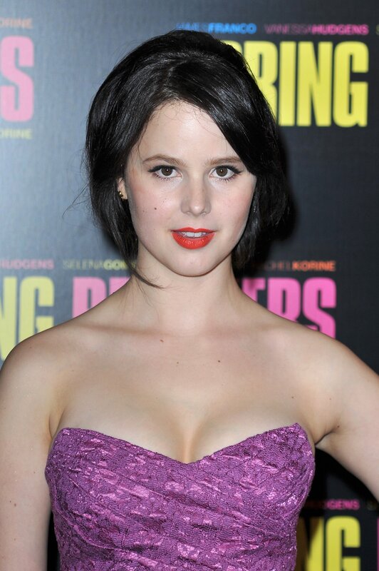 woman in purple dress at event