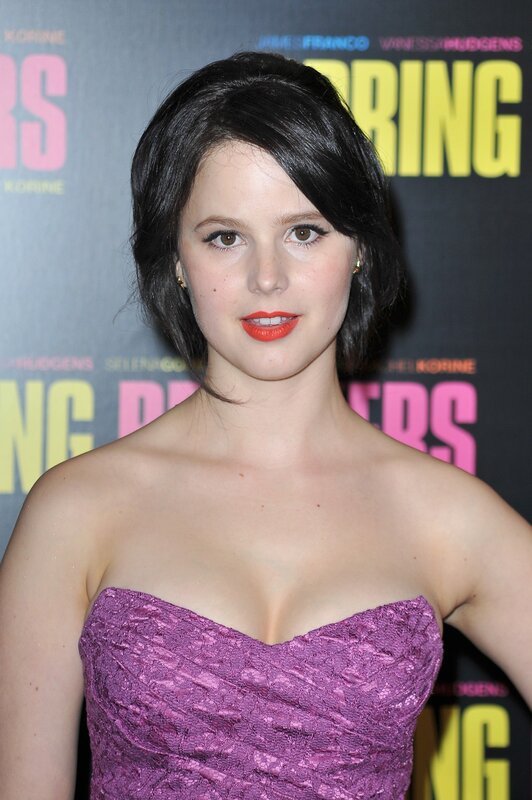 woman in purple dress at event