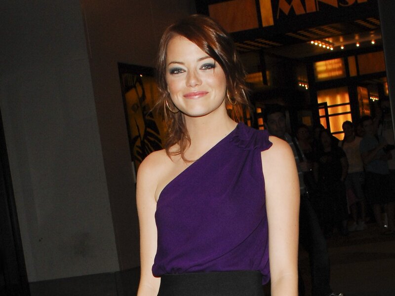Woman in purple dress at event