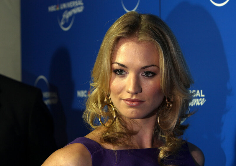 woman in purple dress at event