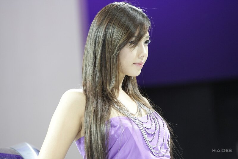 woman in purple dress at event