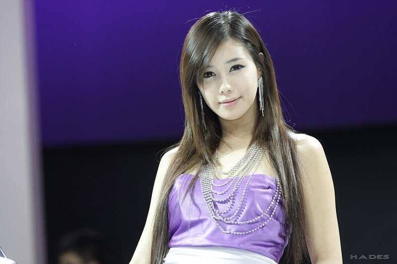 woman in purple dress at event