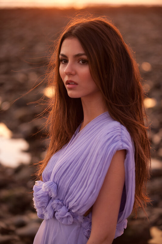woman in purple dress at sunset