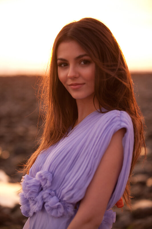 woman in purple dress at sunset