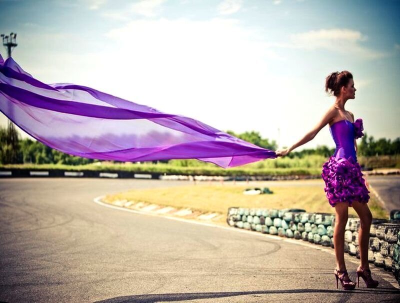 Woman in Purple Dress — Dramatic, Daytime