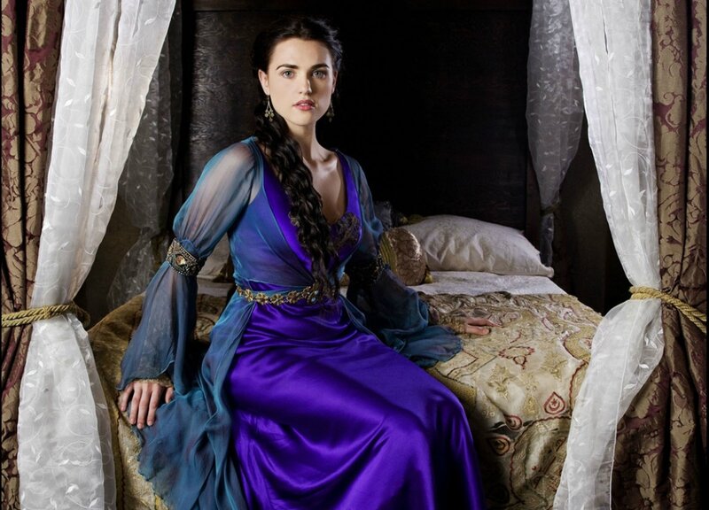 Woman in Purple Dress — Dramatic, Photograph, Bed