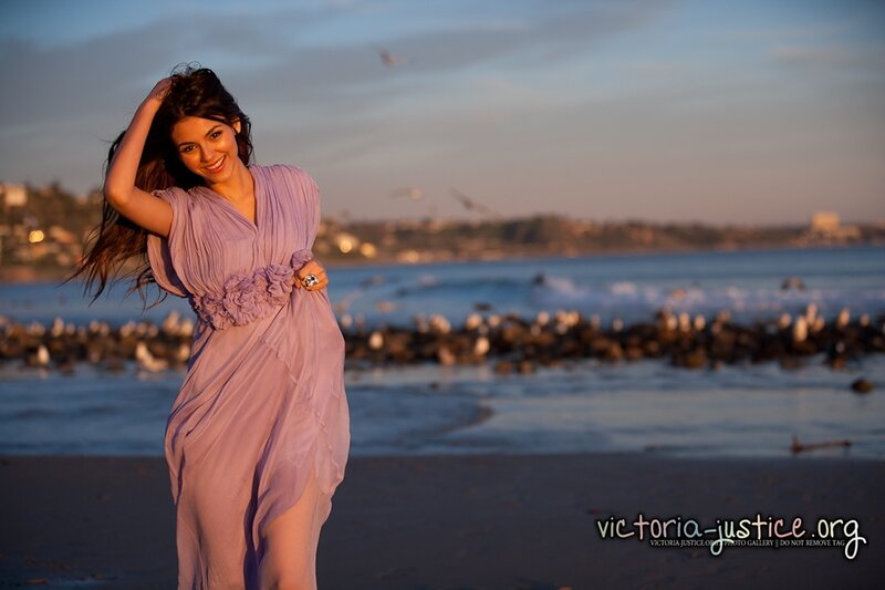 woman in purple dress on beach