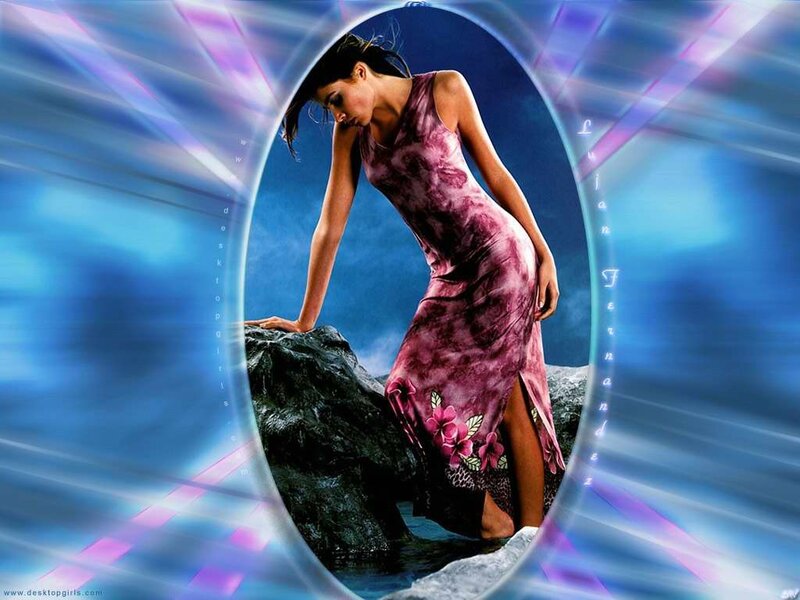 woman in purple dress on rocks