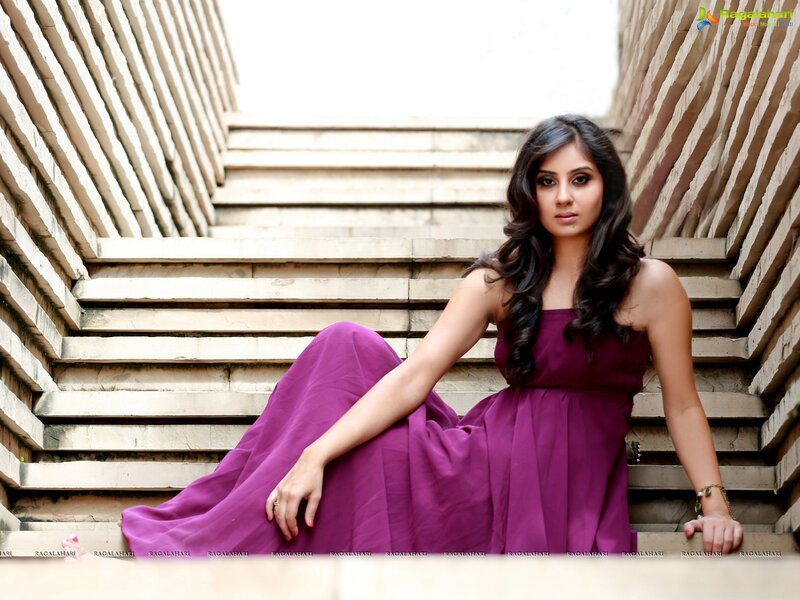 Woman in purple dress on stairs