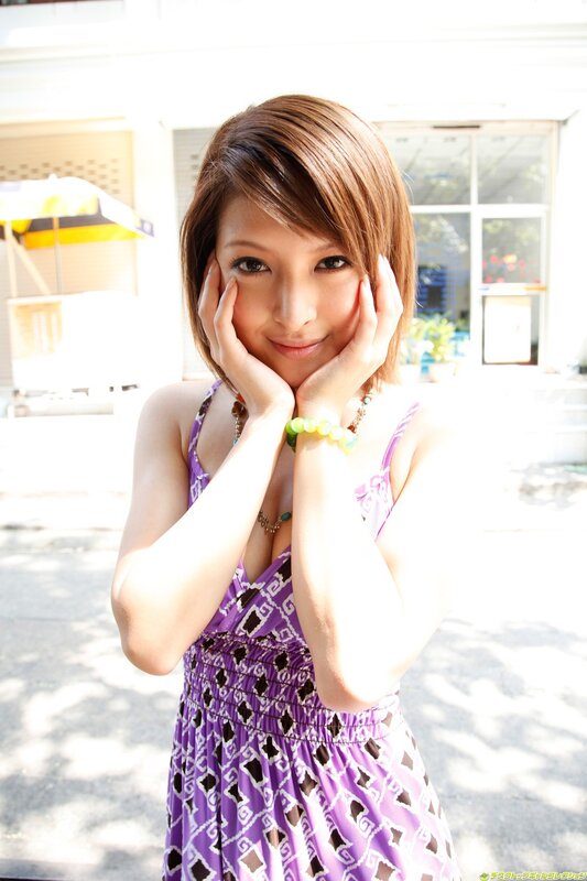 Woman in purple dress outdoors