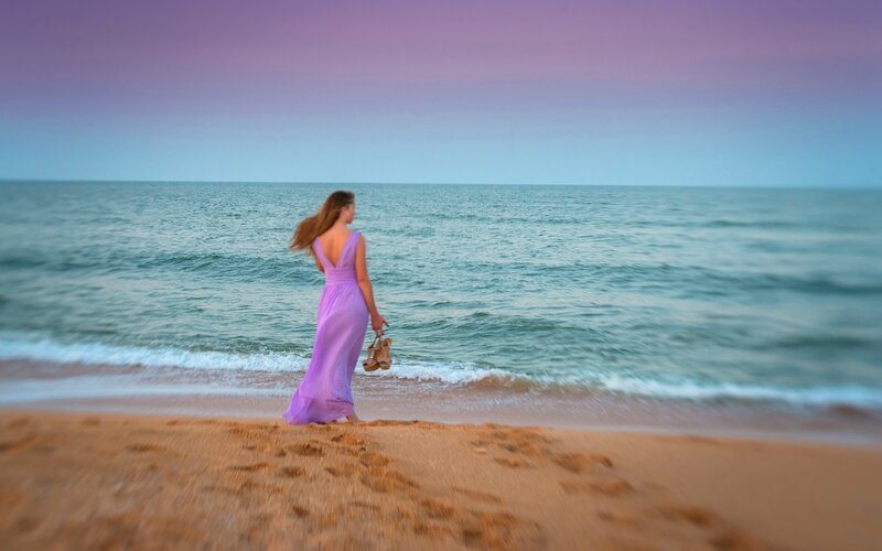Woman in Purple Dress — Serene, Sunset, Photograph, Beach