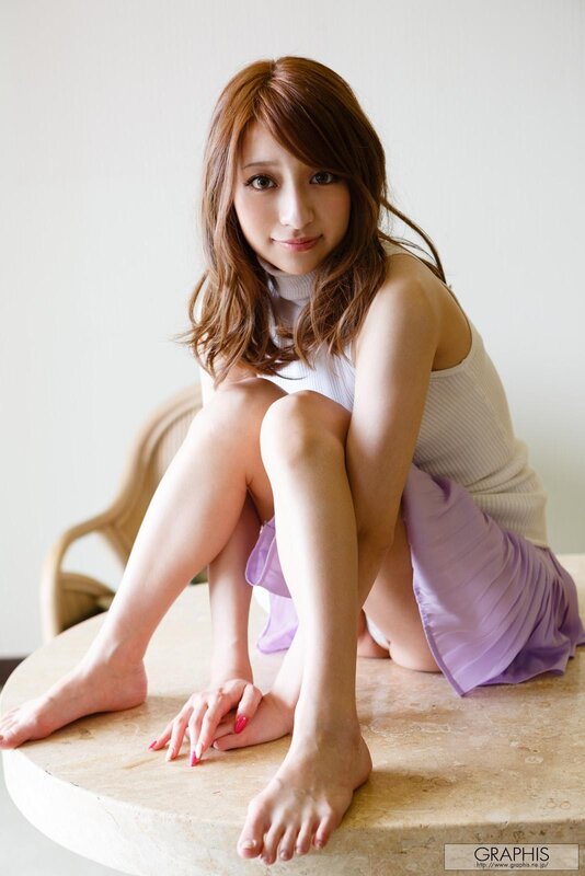 woman in purple dress sitting