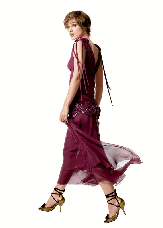 woman in purple dress walking