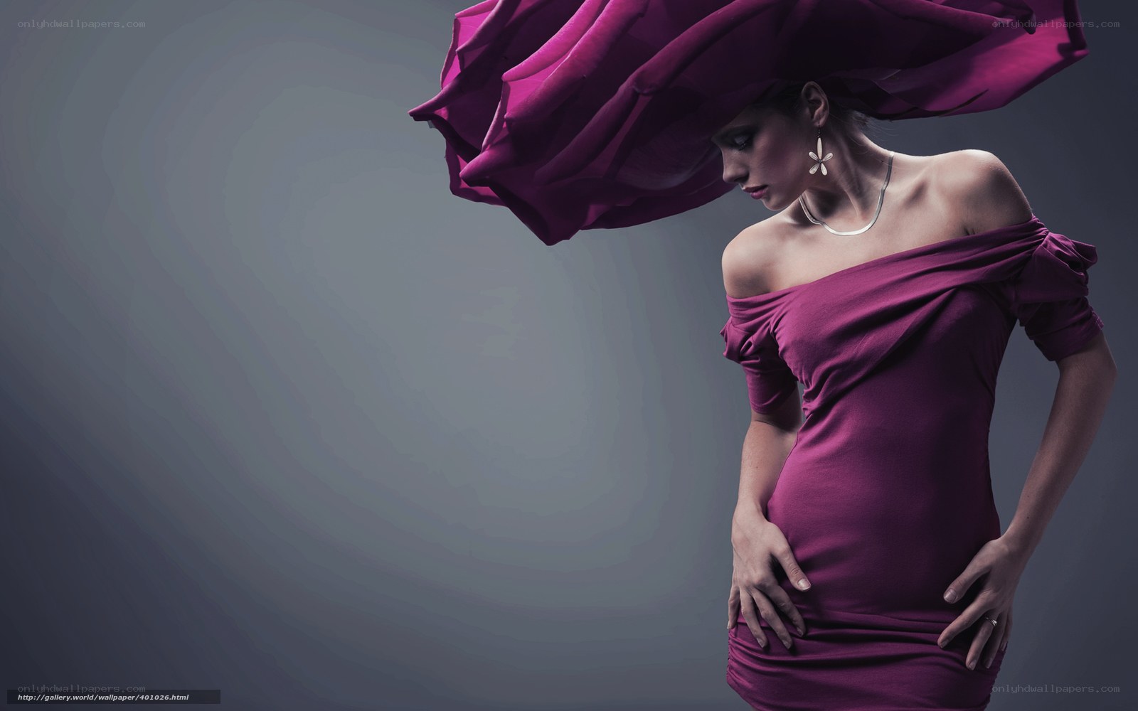 woman in purple dress with flowing fabric
