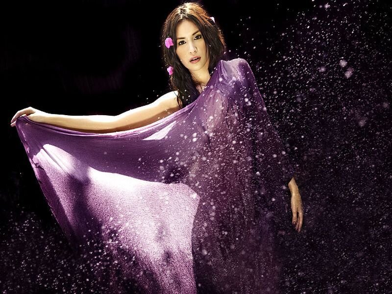 woman in purple fabric