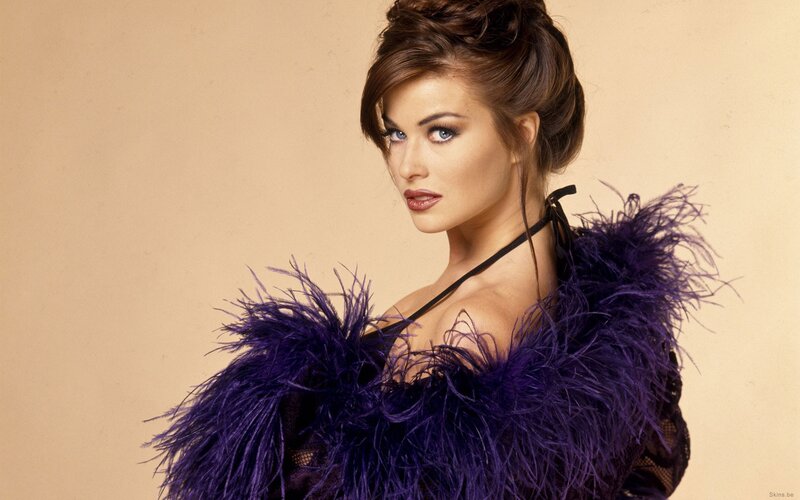 woman in purple feather boa