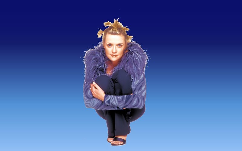 woman in purple feather coat